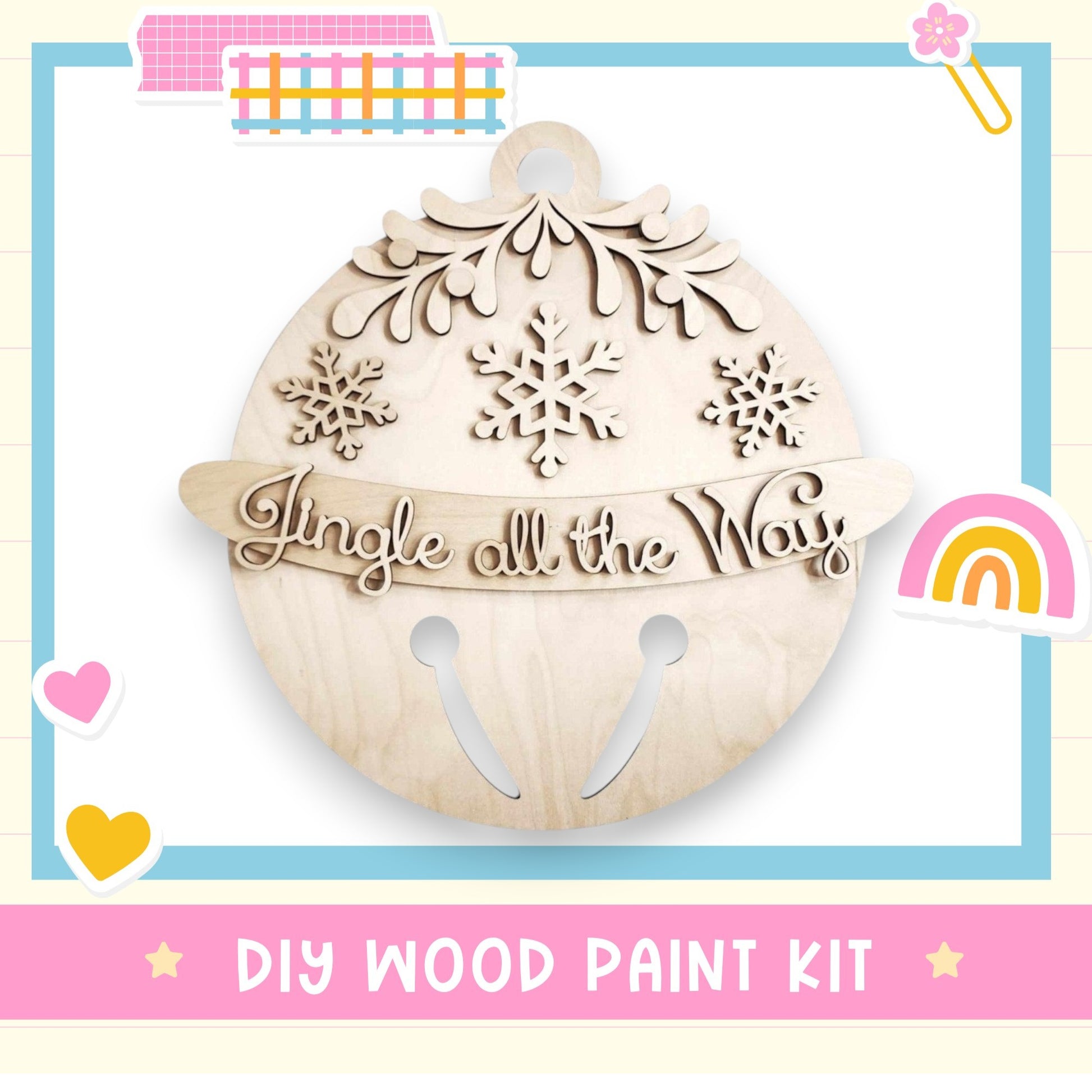 a wooden christmas ornament with a rainbow in the background