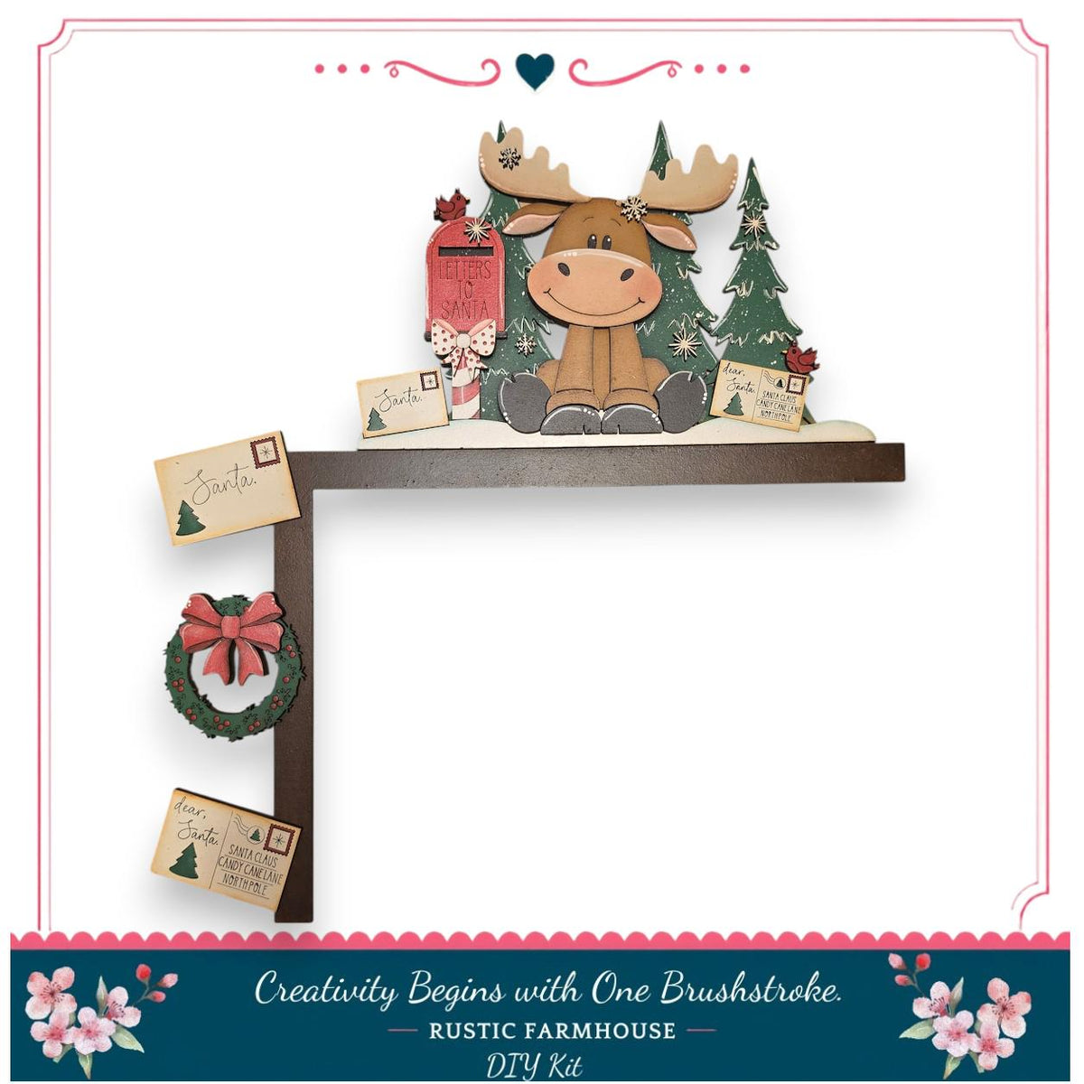 A wooden shelf with a moose figurine, a wreath, and a mailbox, along with a "Santa" card and a "Dear Santa" card. The shelf is decorated with a "Creativity Begins with One Brushstroke" sign, and the image is described as a "DIY Kit" from a "RUSTIC FARMHOUSE".