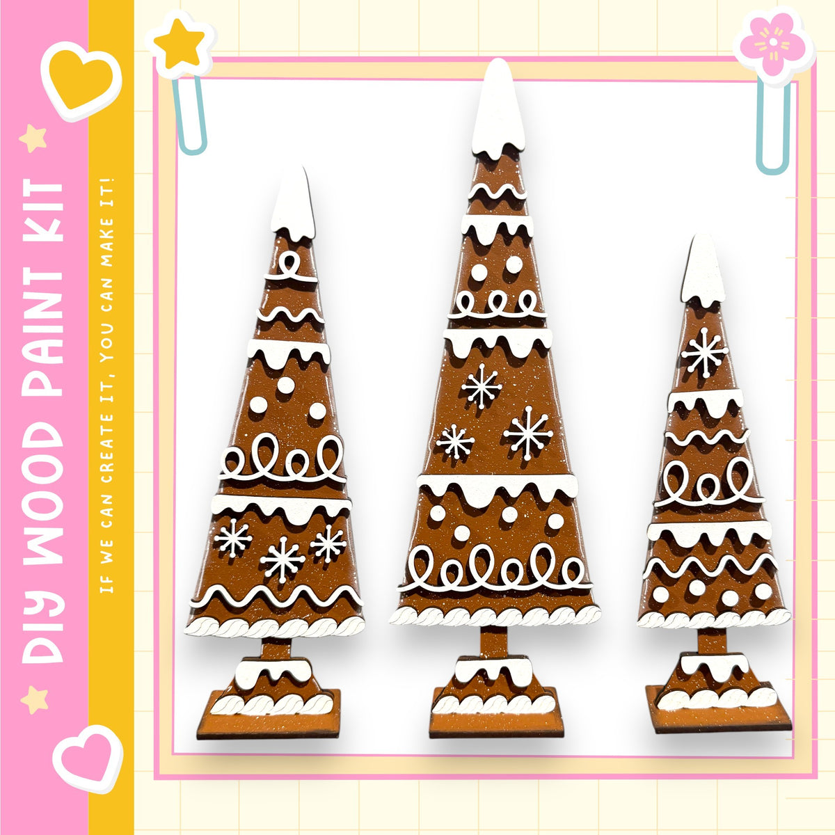 three gingerbread trees, each with unique designs and decorations, arranged in a row against a white background.