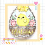 a welcome sign with a yellow chick in a basket