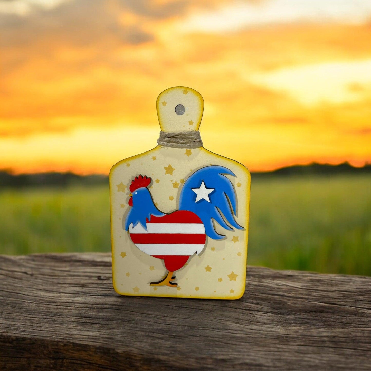 a bottle shaped like a rooster with a flag on it