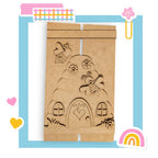 a cardboard box with a drawing of a man and a woman in a car