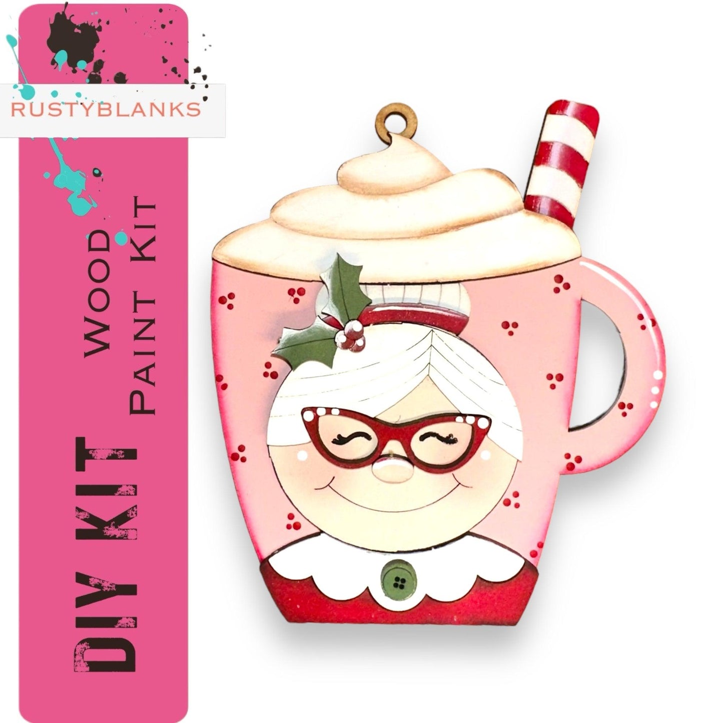 a pink tea cup with a santa clause on it