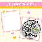 a picture frame with a picture of flowers and a welcome sign