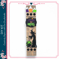 A wooden sign with a witch illustration and the text "Welcome to the pretty witch" displayed on it.