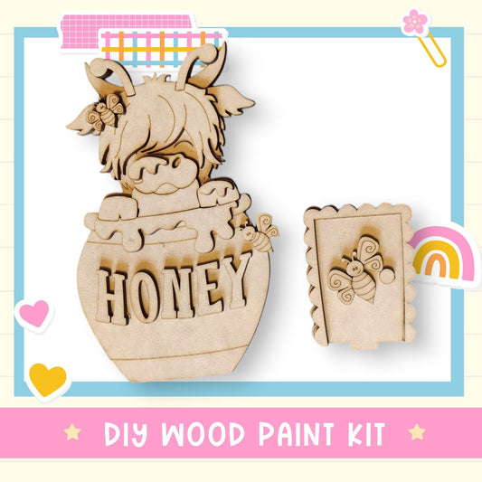 a wooden cutout of a cow with a honey jar