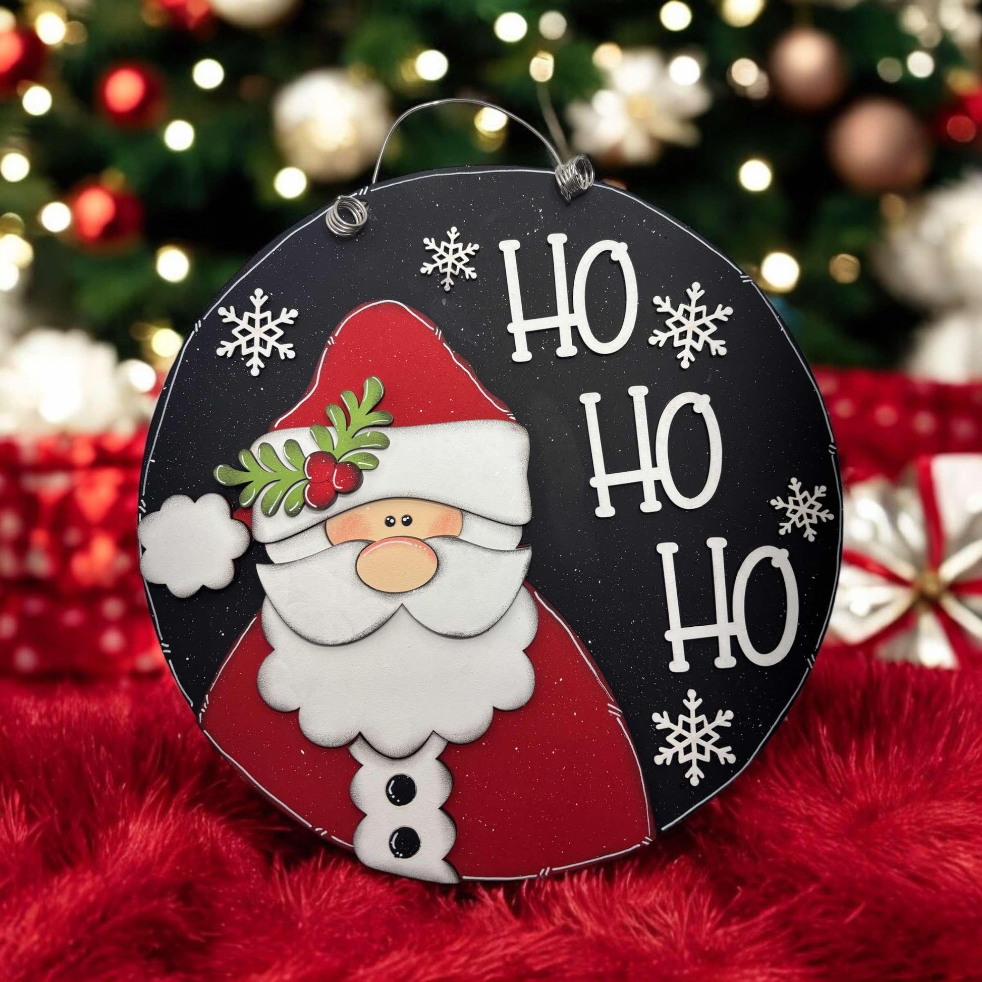 a christmas ornament with a santa clause on it