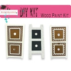 three pieces of wood painted in different colors