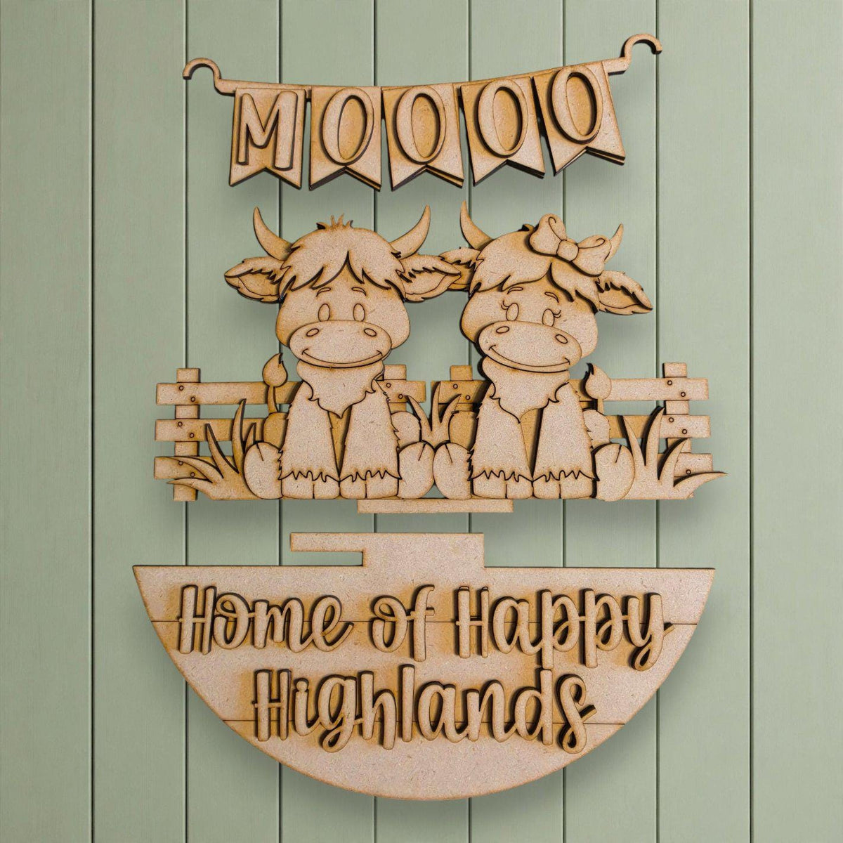 a wooden sign with a banner and two cartoon cow figures, along with the text "Home of Happy Highlands".
