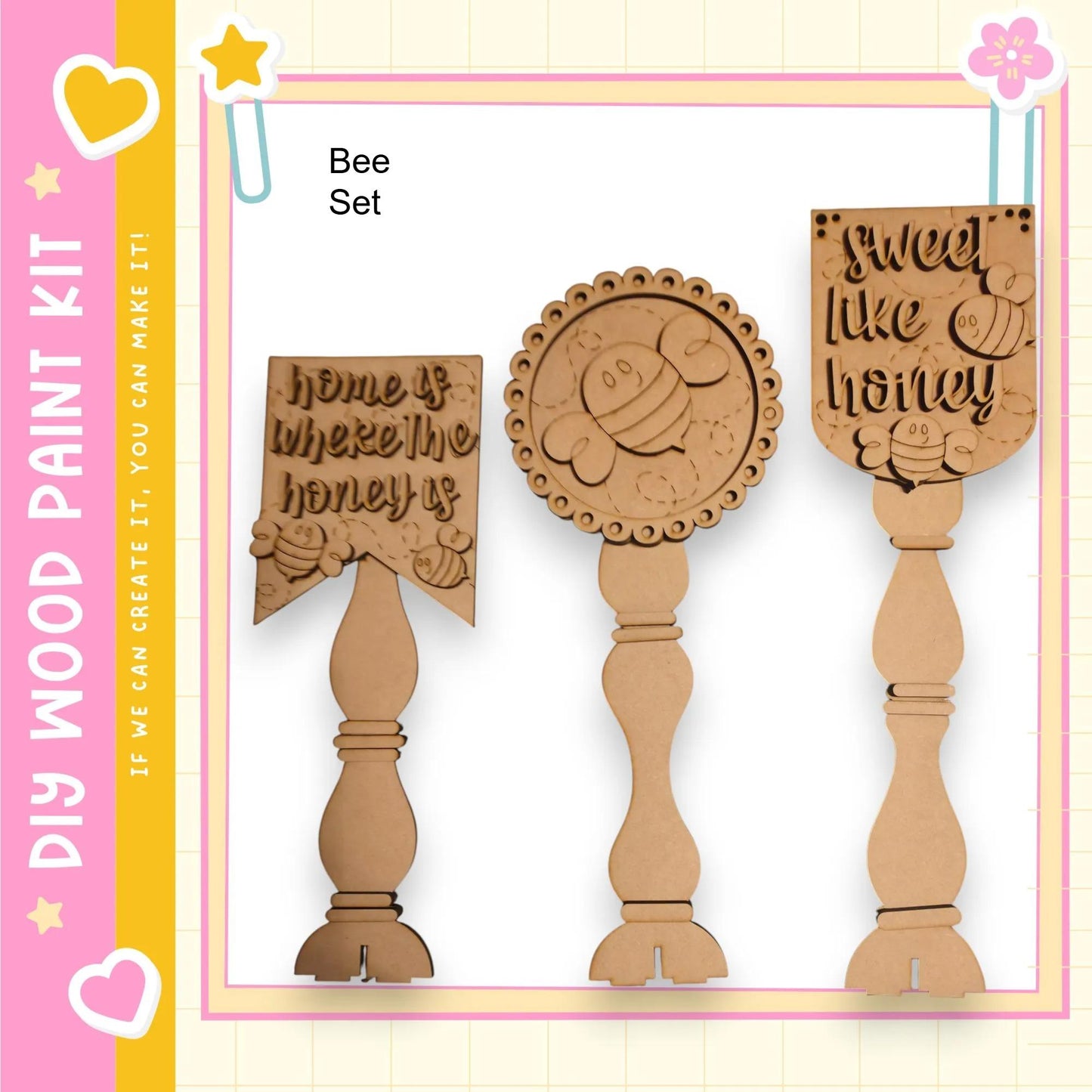three wooden paint brushes with unique designs and text on them.