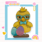 a rubber duck with sunglasses and a bow tie