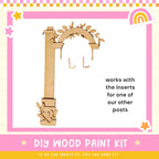 a picture of a wooden craft kit with a picture of an arch