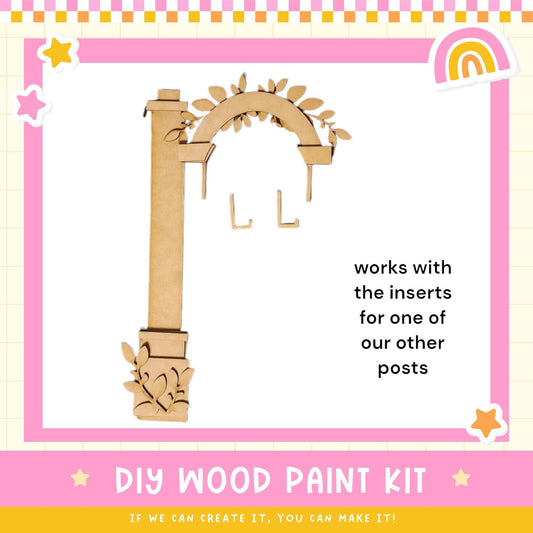 a picture of a wooden craft kit with a picture of an arch