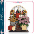 The image is a collage of various fall-themed elements, including a wooden archway, a vase of flowers, pumpkins, and a spindle wheel.