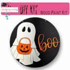 a Halloween-themed DIY kit, including a wooden paint kit and a ghost decoration.