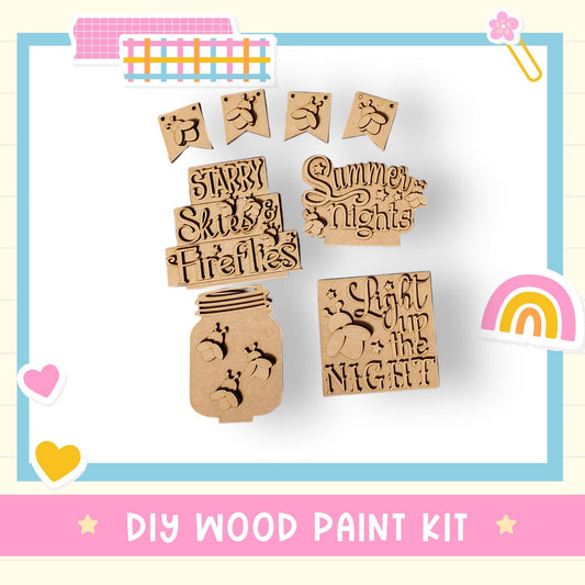 The image is a DIY wood paint kit featuring various wooden shapes and designs, including a mason jar, a sign, and a heart.