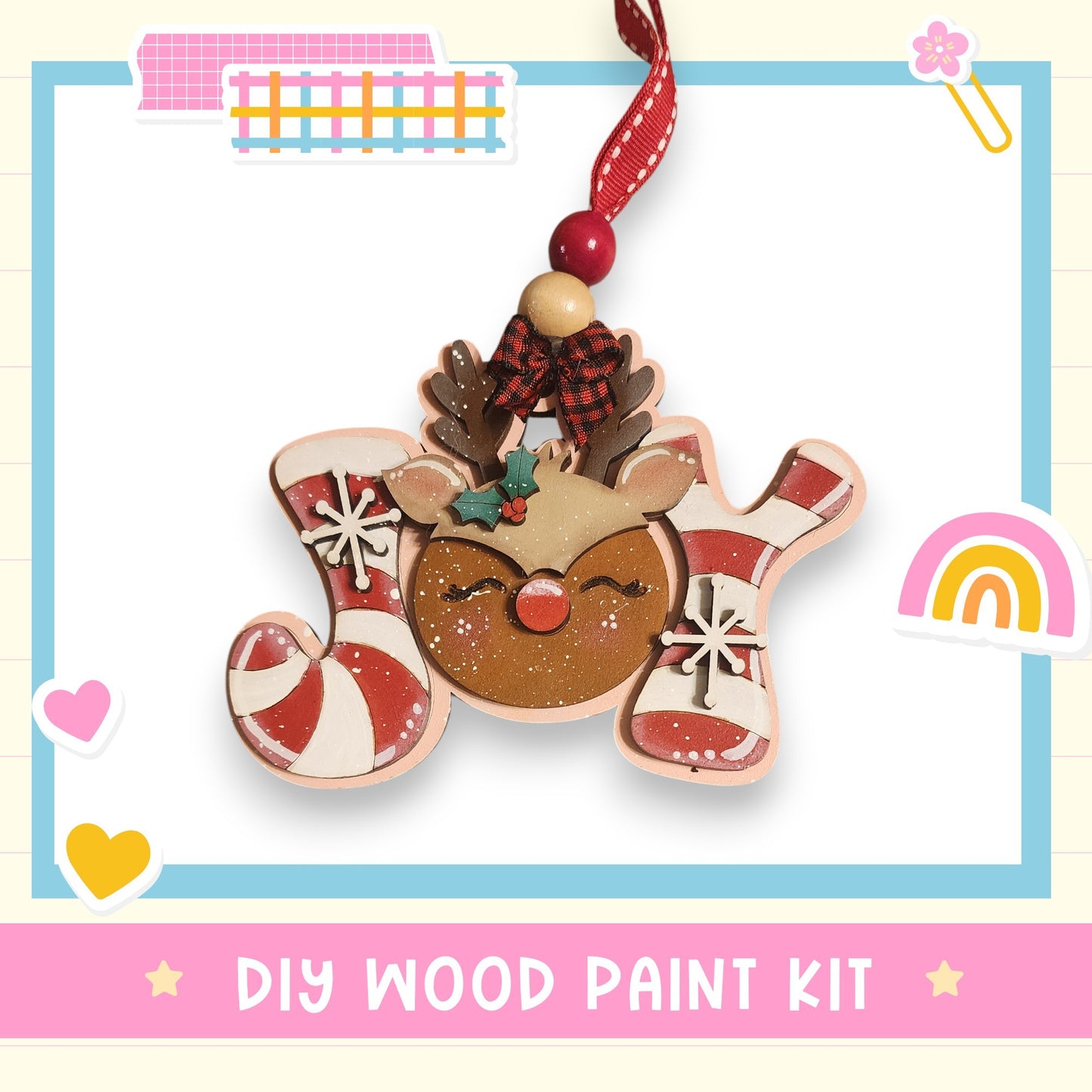 a DIY wood paint kit for creating a wooden ornament with a reindeer and candy cane design.