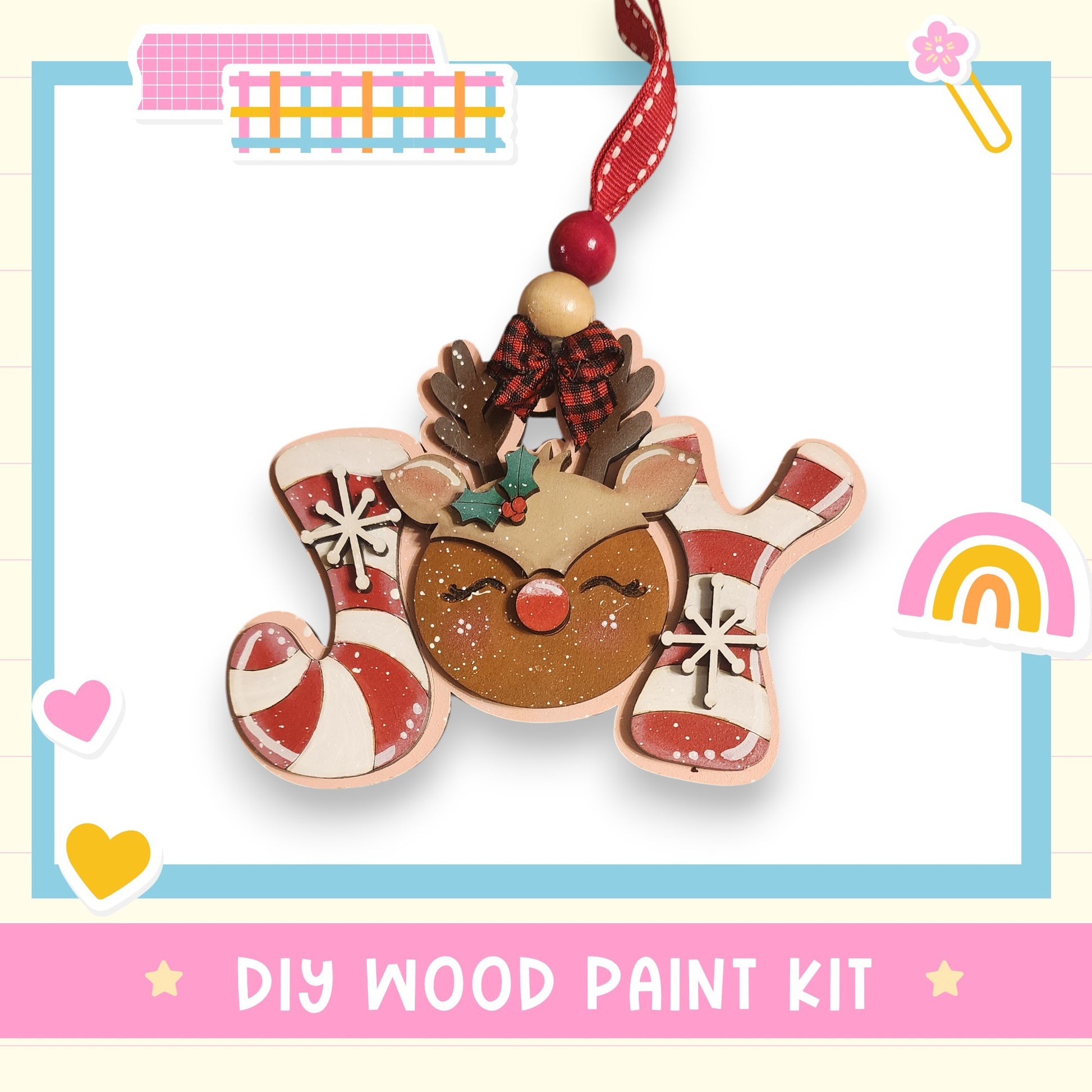 a DIY wood paint kit for creating a wooden ornament with a reindeer and candy cane design.