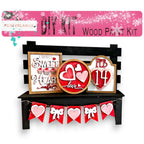 a valentine's day craft kit is displayed on a shelf