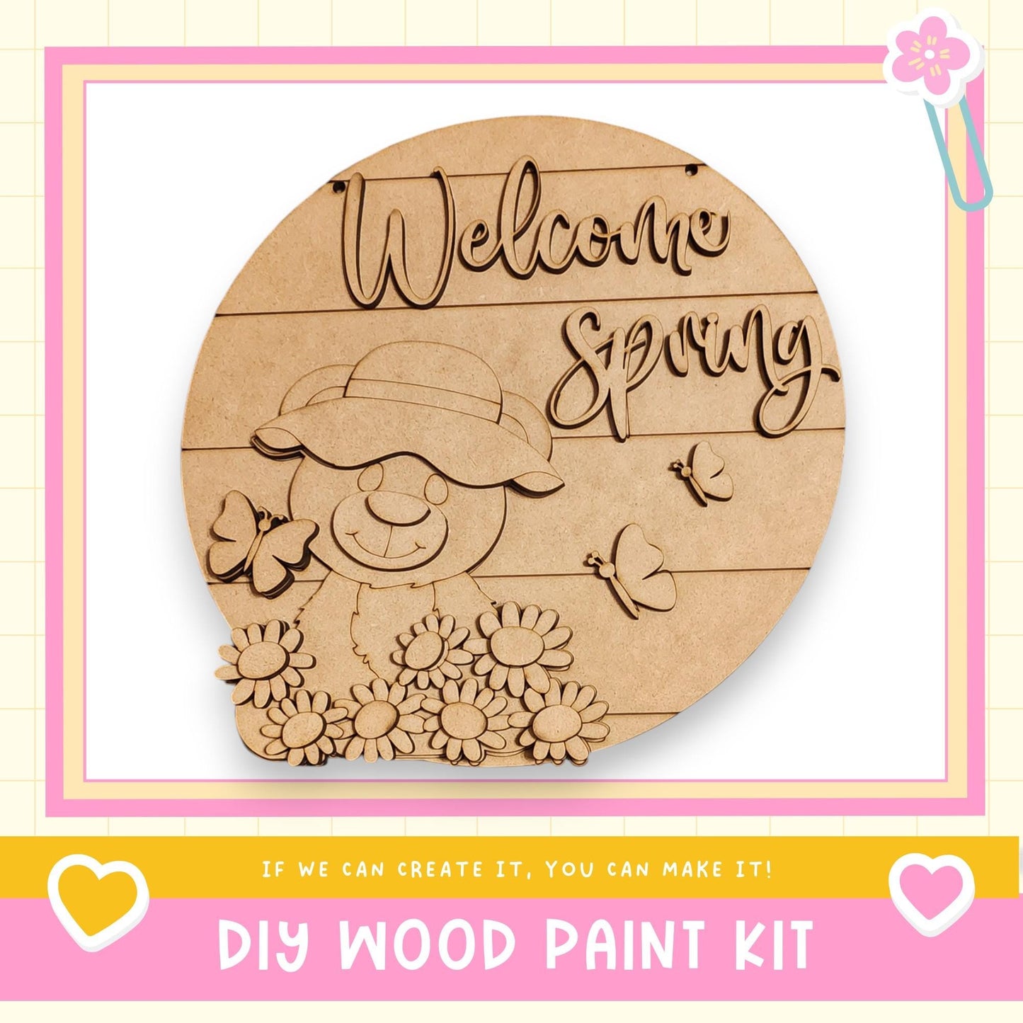 a welcome sign made of wood, with a smiling snowman and flowers as part of the design.