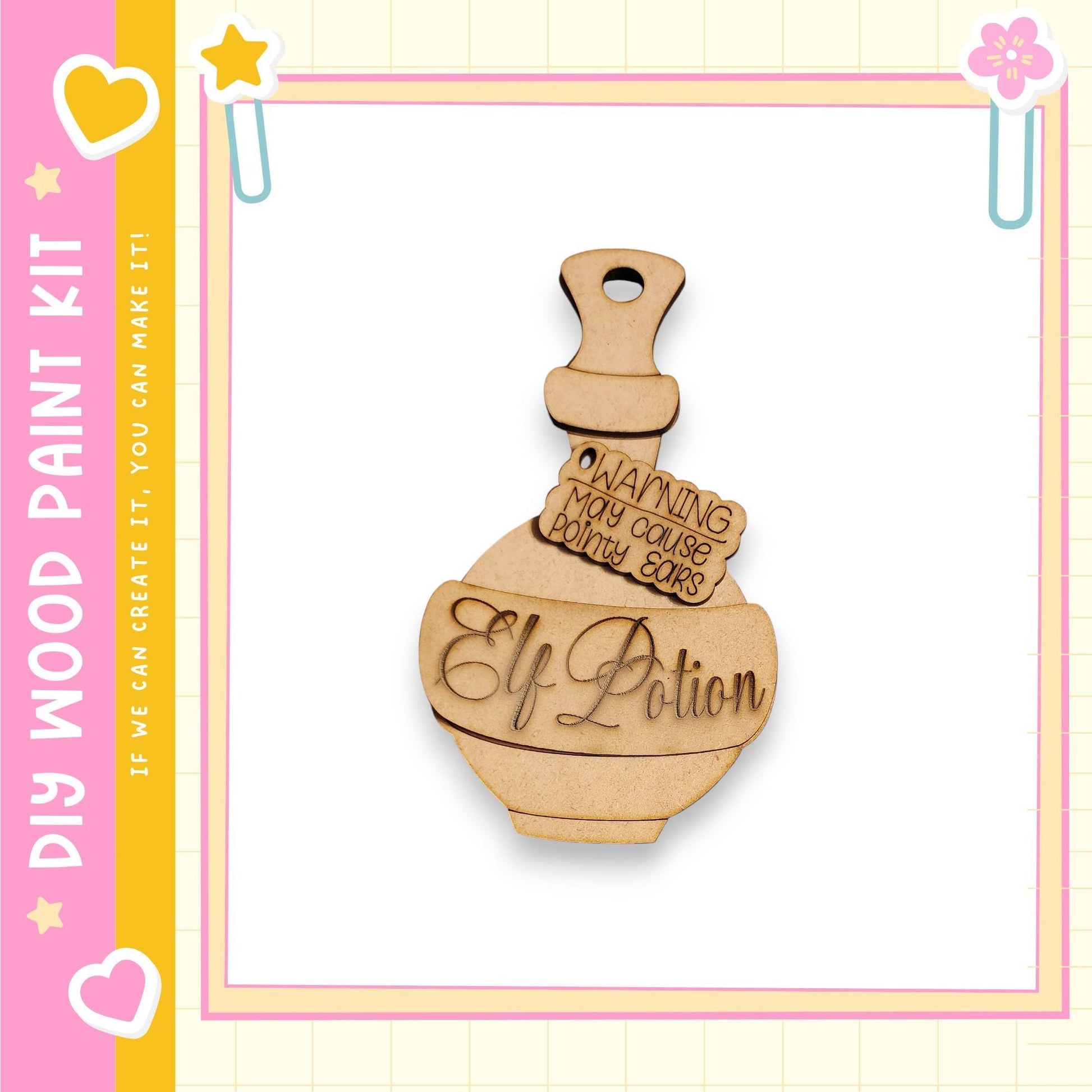 A wooden charm in the shape of a bottle with the word "Elixir" written on it, placed against a pink and yellow background.