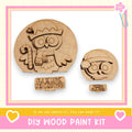 a DIY wood paint kit for creating wooden owls, with two owl-shaped cutouts and a sign that reads "Owl be home for Christmas".