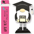 a paper cut out of a graduate penguin