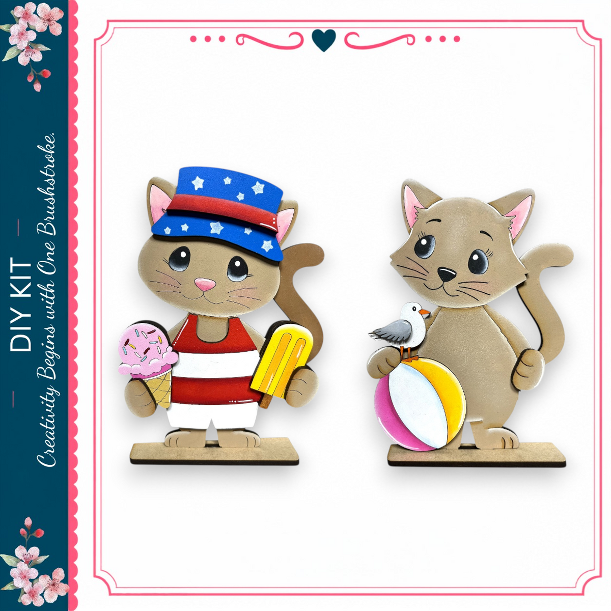 two wooden cat figurines, one wearing a red and white striped shirt and the other holding a beach ball and a bird.