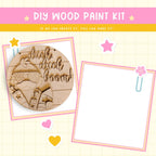 a wooden craft kit with a picture of a woman