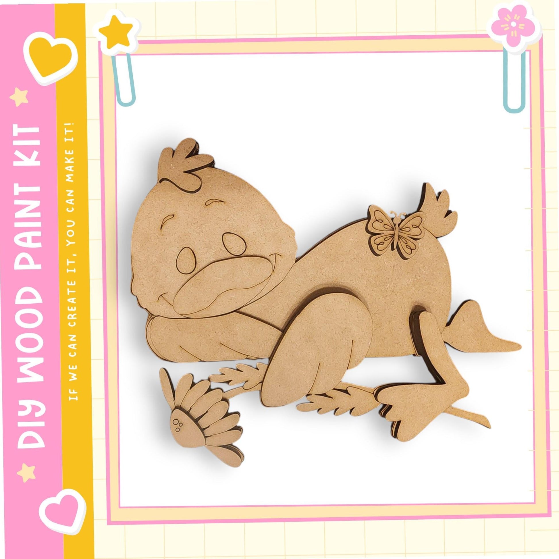 A wooden cutout of a smiling duck with a flower on its back, set against a pink and yellow background with decorative elements.
