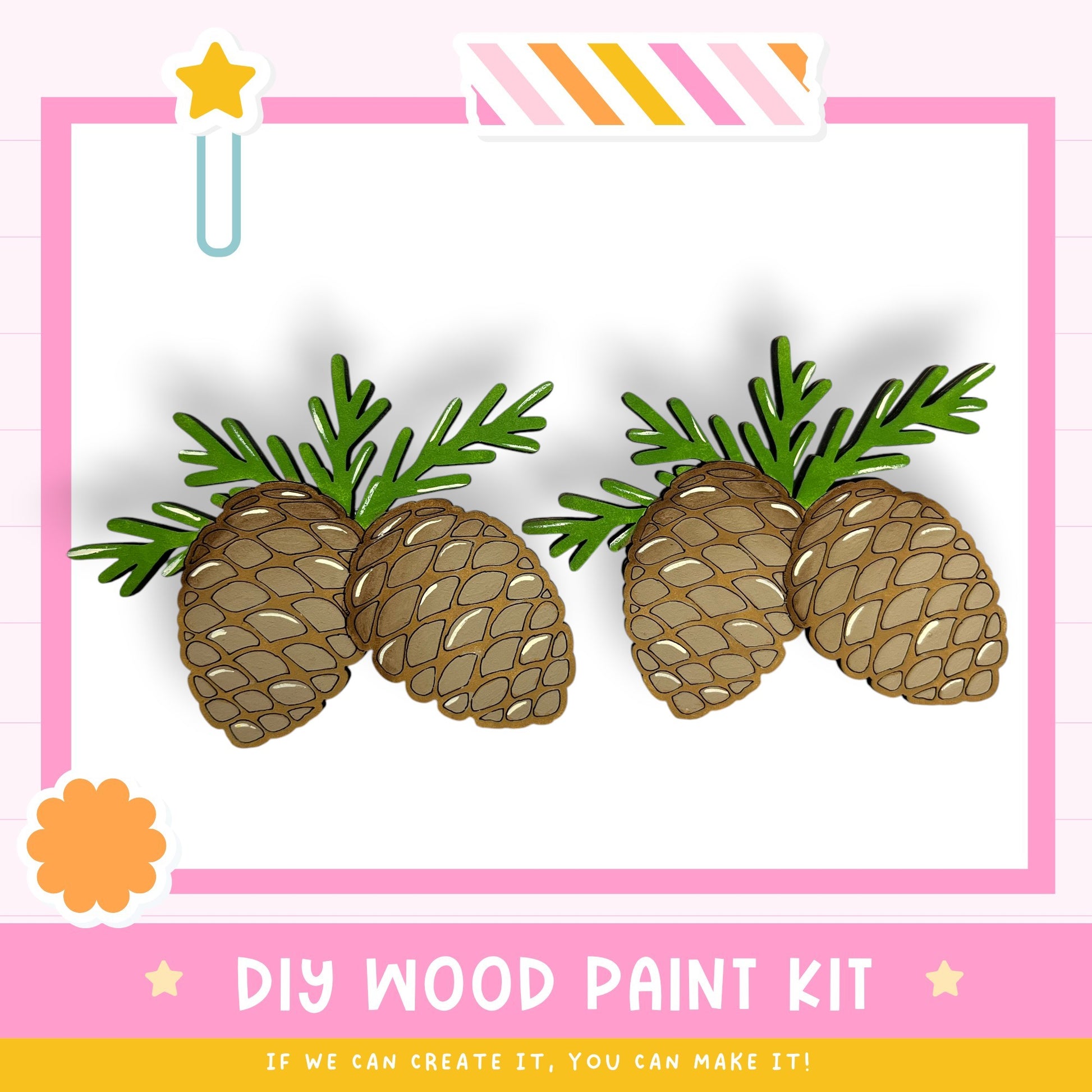 The image is a colorful advertisement for a DIY wood paint kit, featuring a pair of pine cones with green leaves on a white background.