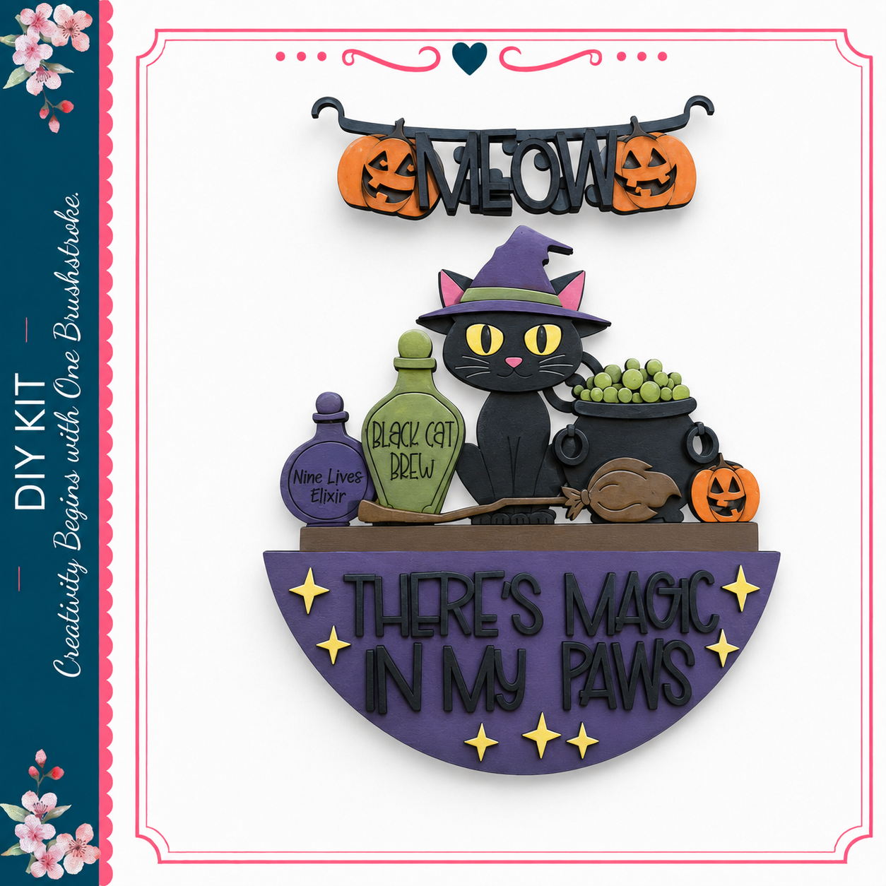 The image is a Halloween-themed DIY kit featuring a black cat wearing a witch's hat, surrounded by Halloween-themed objects such as pumpkins, a broomstick, and a cauldron. The kit includes a sign that says "There's Magic in My Paws" and a black cat figurine.