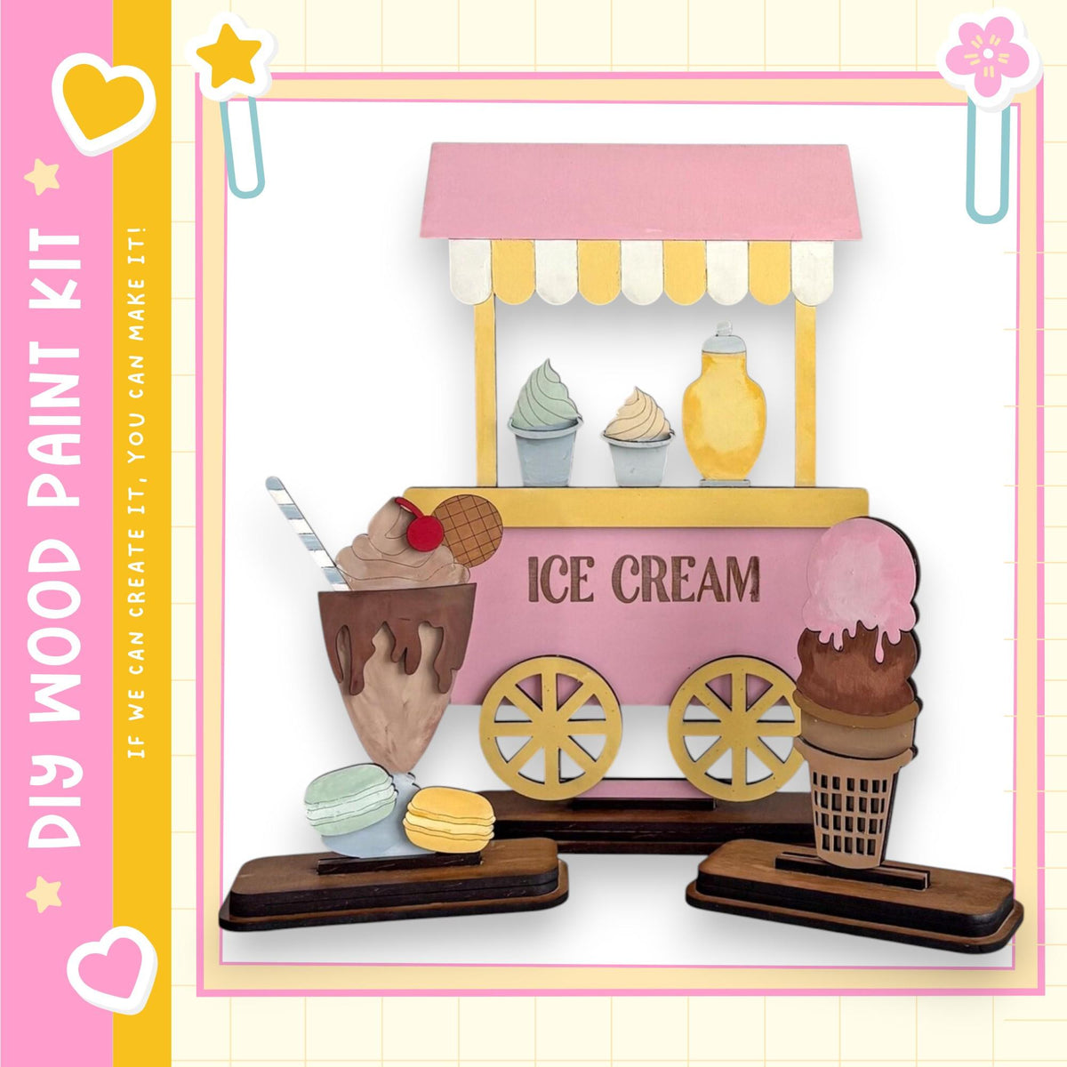 A colorful and whimsical ice cream shop display featuring a pink and yellow ice cream truck, various ice cream flavors, and decorative elements such as hearts and stars.