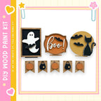 a Halloween-themed display with various spooky and festive elements, including a ghost, a "boo!" sign, a cat, pumpkins, and a banner.