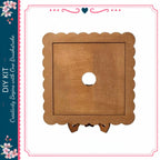 a wooden frame with a scalloped edge, which appears to be a decorative piece.