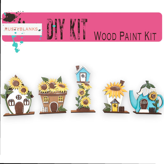 a picture of a wooden paint kit with sunflowers and houses