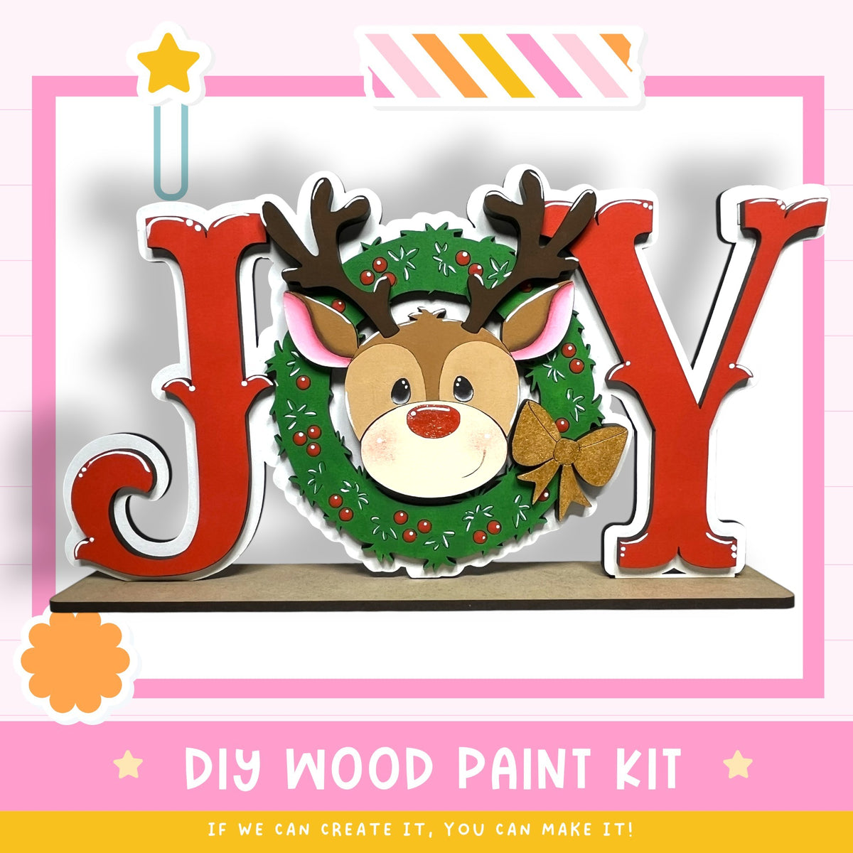 a DIY wood paint kit for creating a wooden ornament with a reindeer face and a wreath.