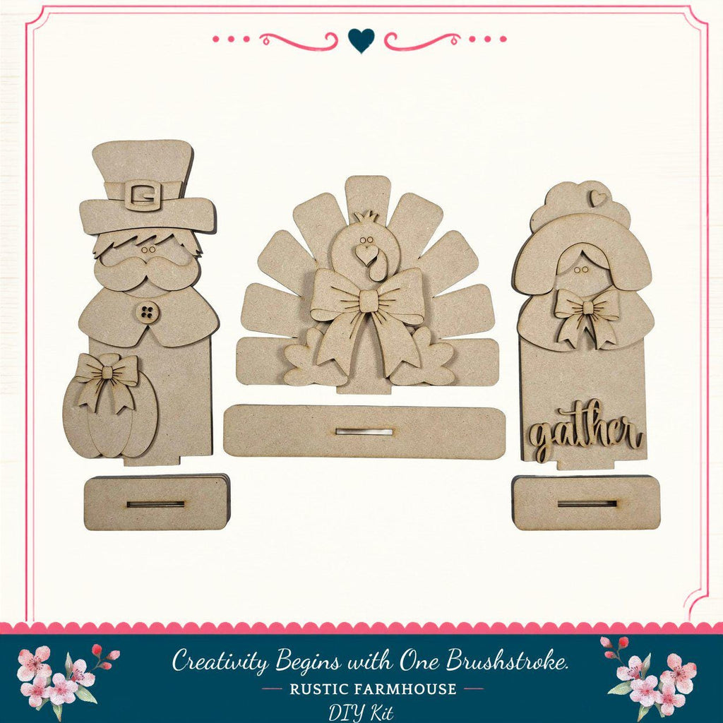 three wooden cutouts of characters, including a man, a woman, and a turkey, arranged in a row.