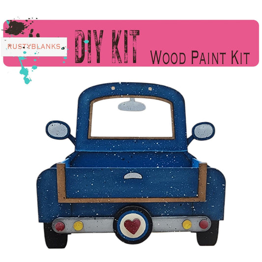 a blue truck with a heart painted on it