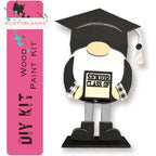 a paper cut out of a person wearing a graduation hat
