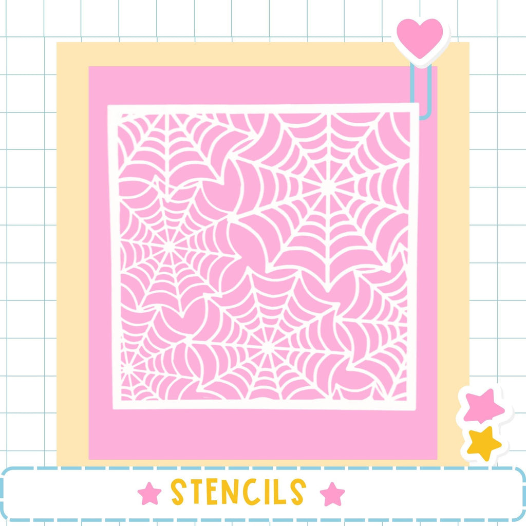 a large square with a pink spider web pattern on it, surrounded by a yellow border. The image is framed by a pink border and includes a heart and two stars as decorative elements. The word "STENCILS" is written in the bottom right corner of the image.
