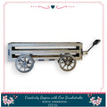 A wooden wagon with a metal frame and wheels, displayed against a white background.