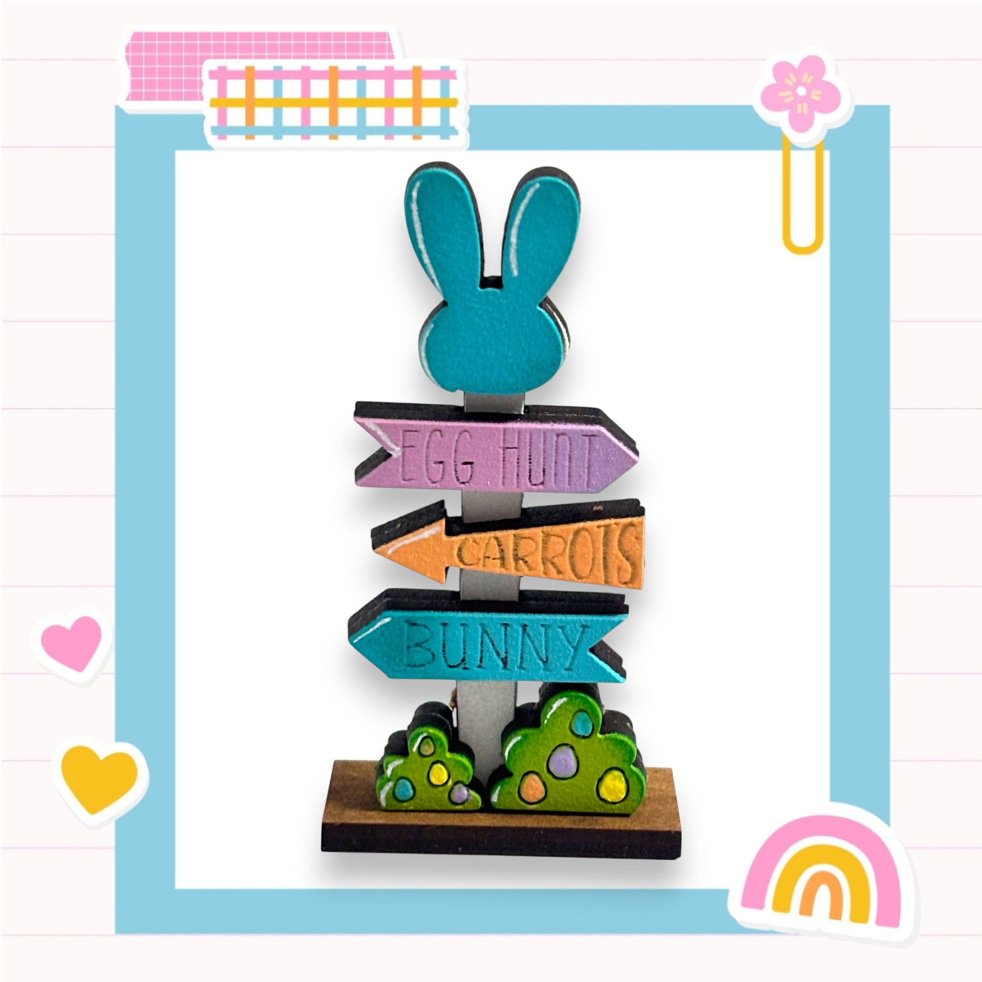 A colorful wooden signpost with directional signs for Easter egg hunt, carrots, and bunny, surrounded by various Easter-themed stickers and decorations.