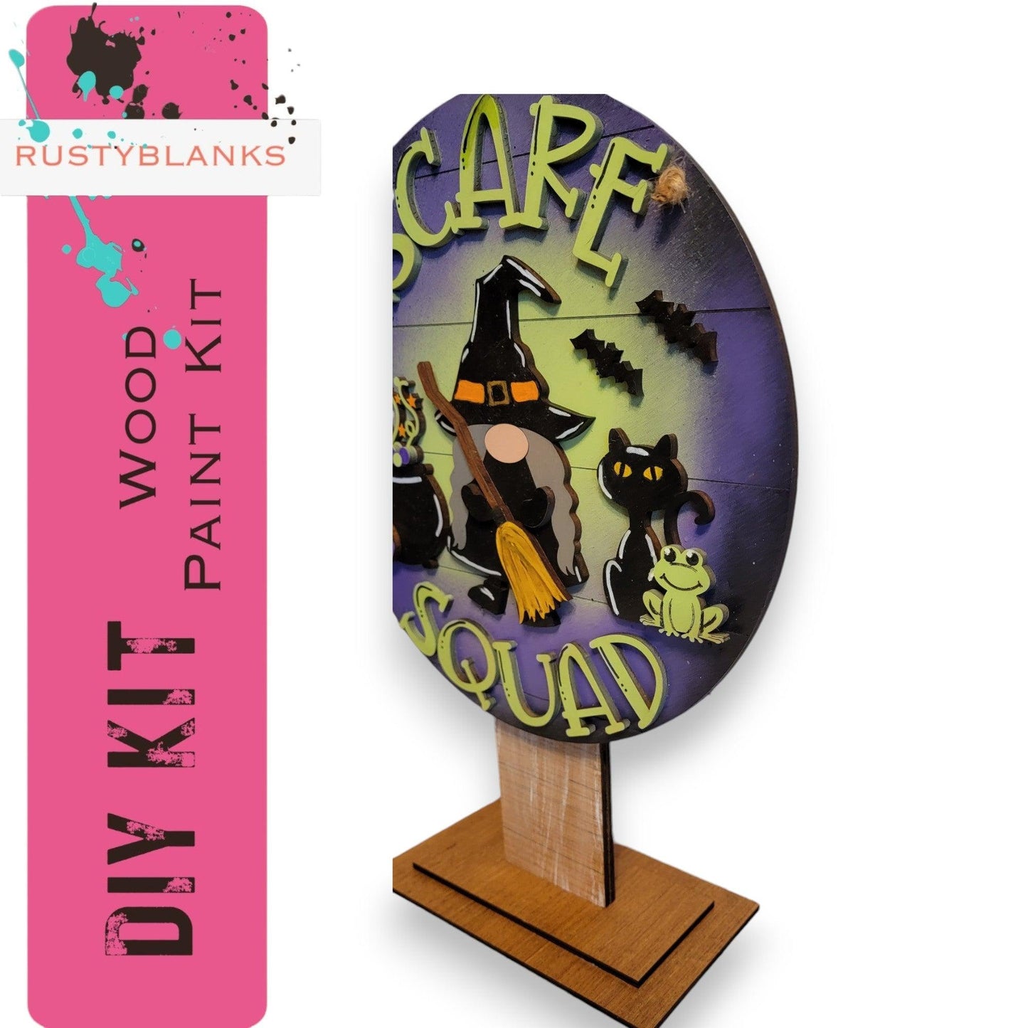 a wooden sign with a picture of a witch on it