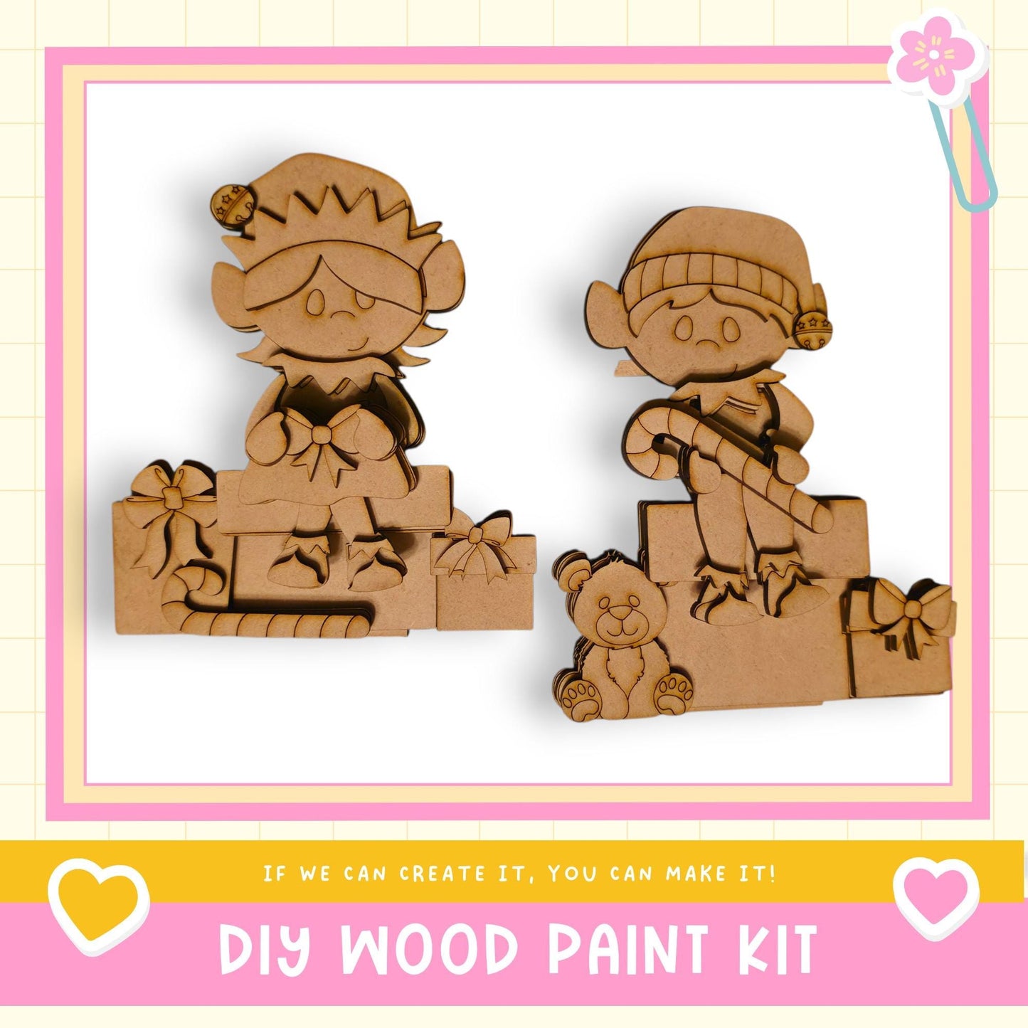 two wooden figures, likely representing a couple, sitting on a wooden base. The figures are decorated with bows and other embellishments, suggesting they are intended as a gift or decoration. The image also includes text that reads "DIY WOOD PAINT KIT" and "If we can create it, you can make it!" This indicates that the image is likely a promotional material for a DIY wood paint kit, encouraging viewers to create their own wooden figures.
