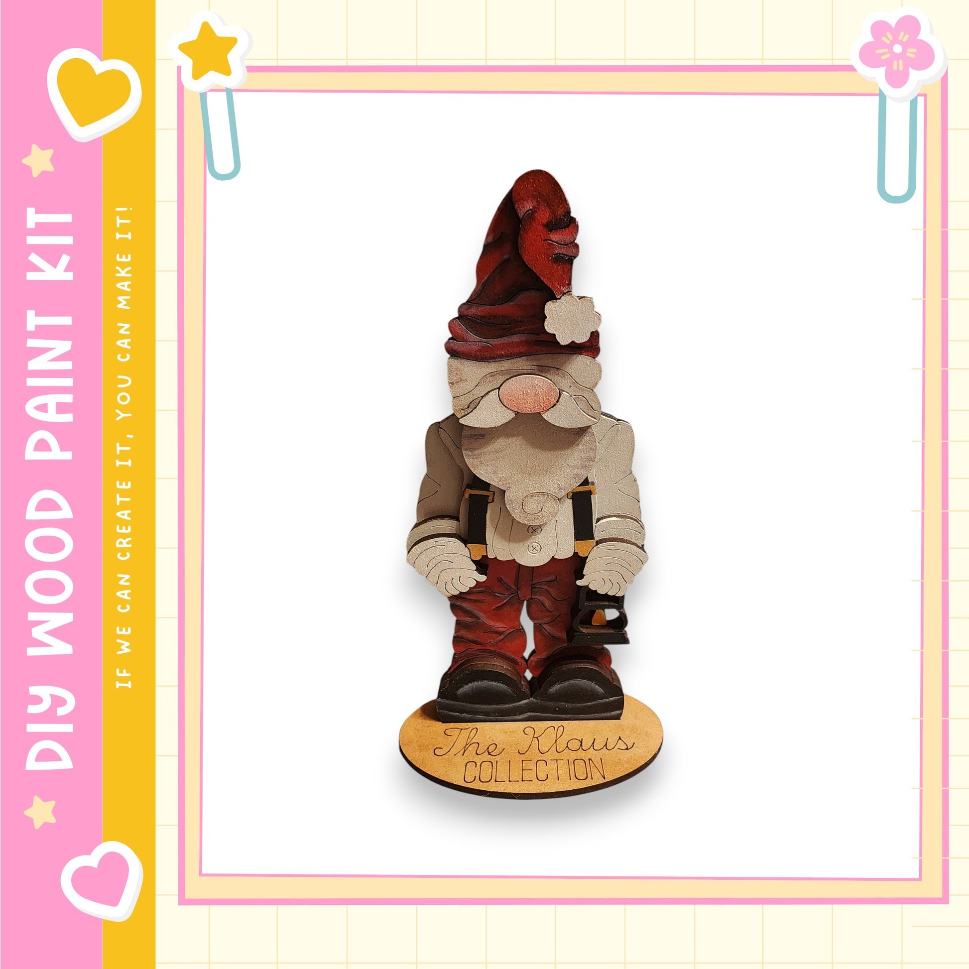 a wooden gnome figurine wearing a red hat and holding a pipe, standing on a wooden base with the text "The Klau Collection" written on it.
