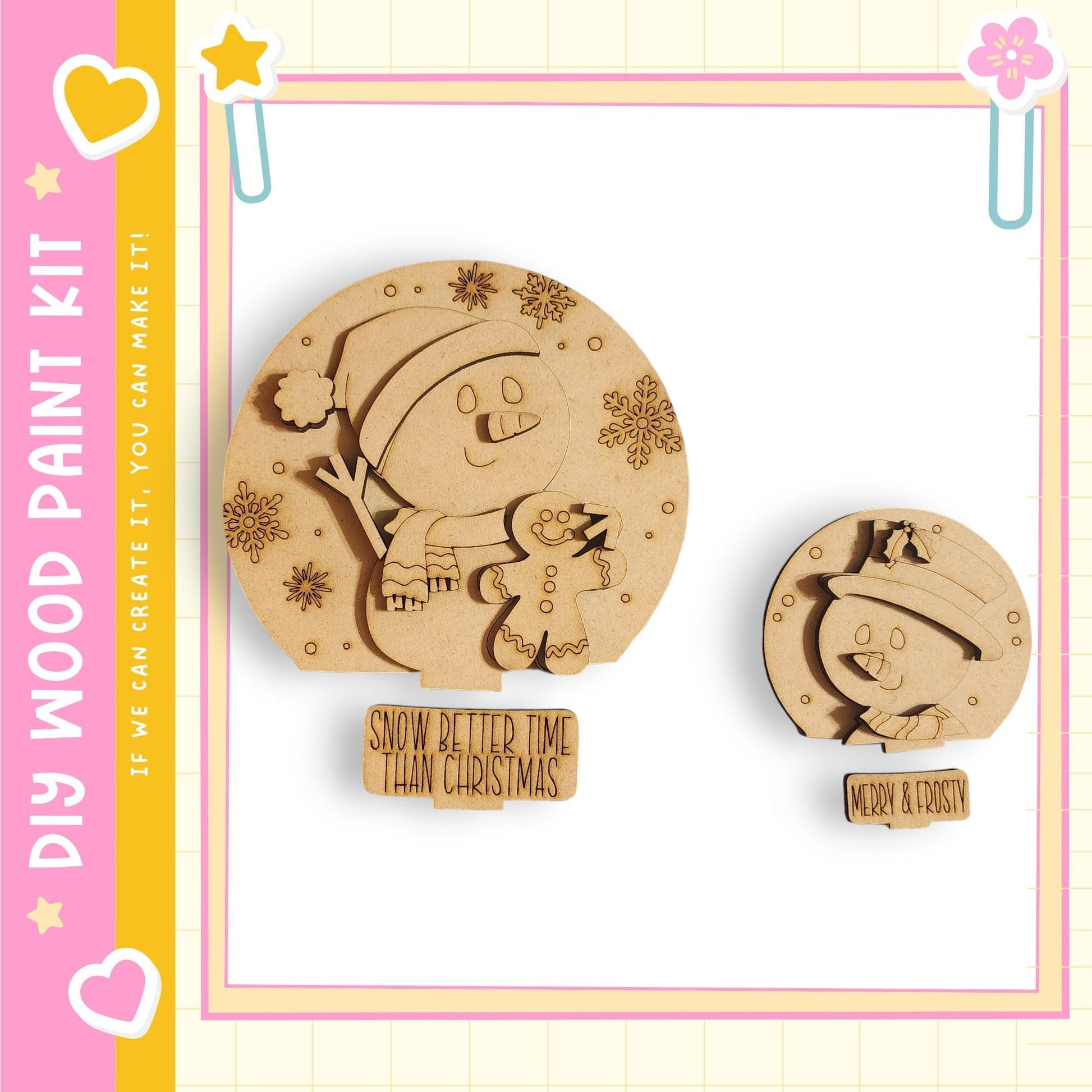 two wooden snowman ornaments, one larger and one smaller, both with a smiling face and snowflake decorations. The larger snowman is positioned on the left side of the image, while the smaller one is on the right. The text "MY WOOD PAINT KIT" is visible, along with the phrase "IF WE CAN CREATE IT, WE CAN MAKE IT" and "SMOOTH & CRISTAL".