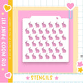 The image is a colorful and playful design featuring a grid of pink rabbit silhouettes against a pink background. The design includes various decorative elements such as hearts, stars, and a clip, creating a whimsical and visually appealing composition.