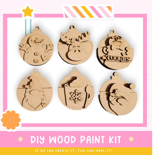 a DIY wood paint kit with six wooden ornaments in various shapes and designs, including a snowman, moose, cookies, gnome, snowflake, and Santa Claus.