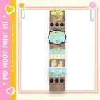 A vertical wooden sign with various illustrations and text, including a lemonade sign, a heart, and other decorative elements, all set against a pink and yellow background.